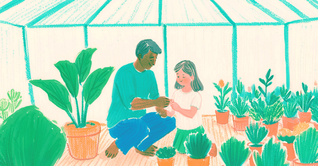 Smiling father and daughter learning to garden in a greenhouse,